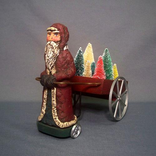 Paper Mache Santa Claus Pulling A Cart Of Trees