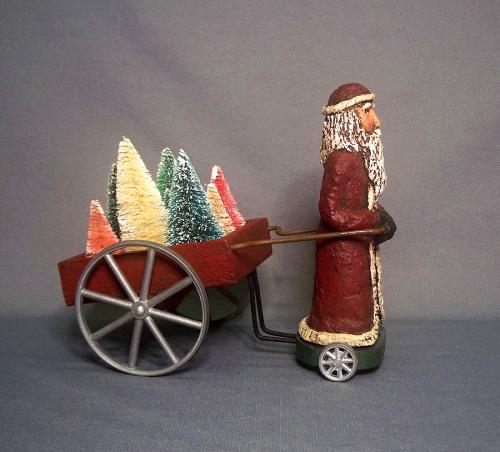 Paper Mache Santa Claus Pulling A Cart Of Trees