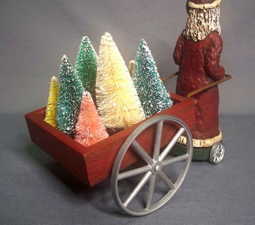 Paper Mache Santa Claus Pulling A Cart Of Trees